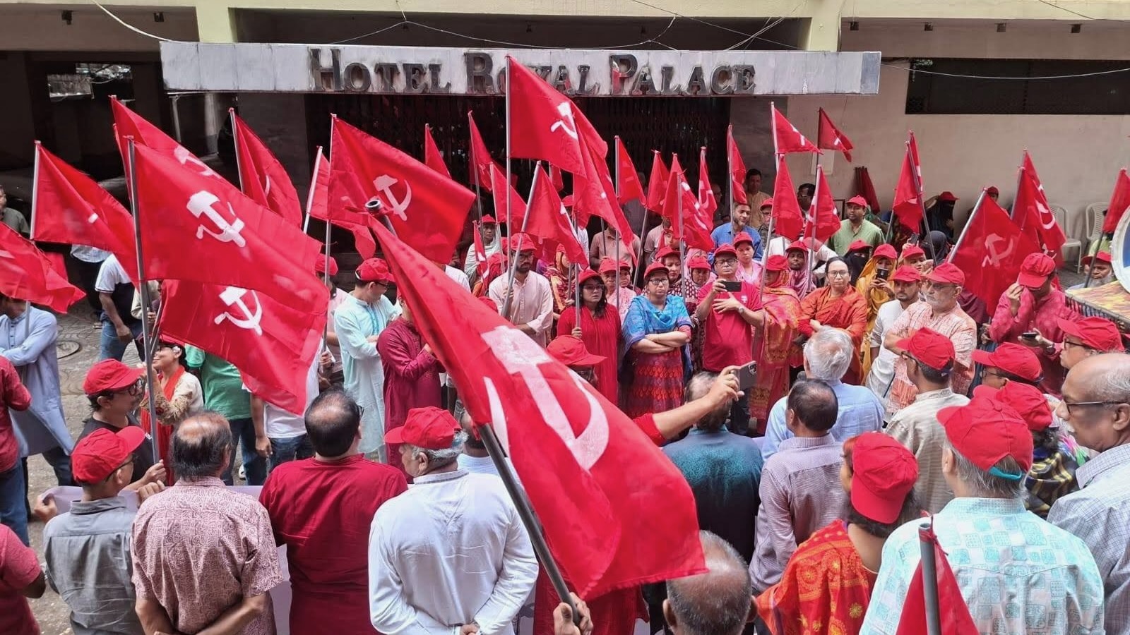 Workers in Bangladesh raise red flags with the hammer and sickle